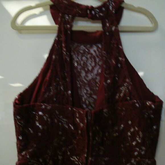 B. Darlin Juniors' Metallic Lace Bodycon Dress. MSRP $110