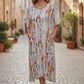 Printed Midi Dress with Asymmetrical Hem – Orange Multi