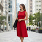 Solid Fit & Flare Sleeveless Dress by Fiori. Red